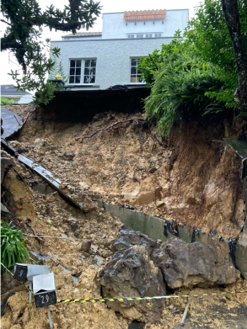 One of four slips on West End Rd in Westmere showing one house teetering on the edge of a joint...