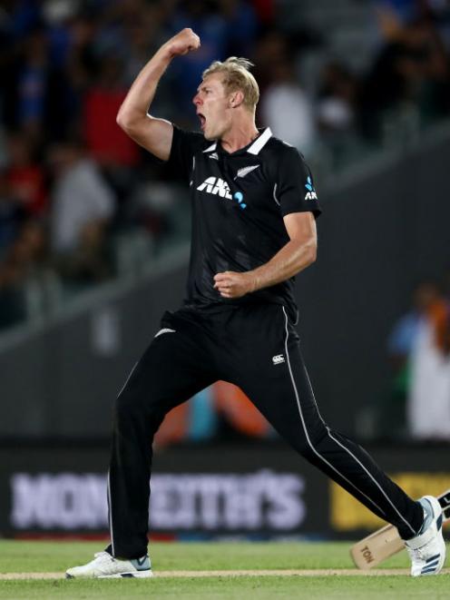 Kyle Jamieson of the Black Caps celebrates the wicket of Navdeep Saini of India during game two...
