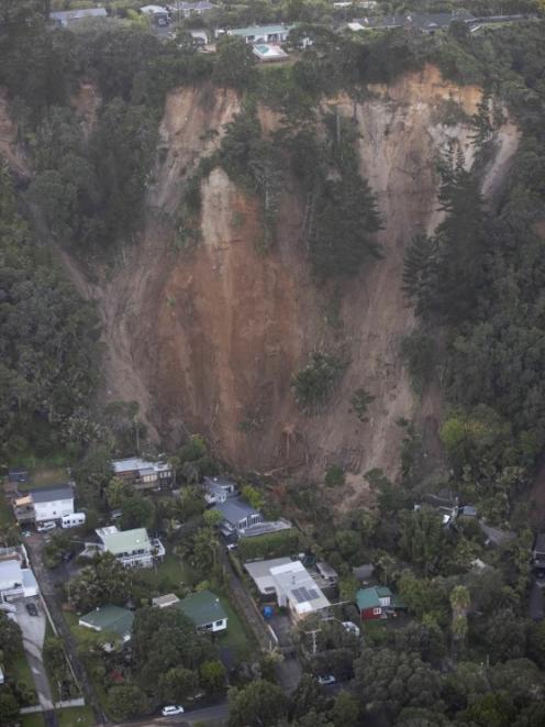 Aerial photographs show the extent of damage caused by a landslip at Muriwai. Photo: NZ Herald
