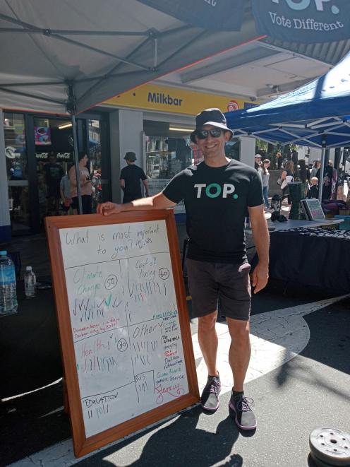 Mr Manji campaigning at the Thieves Alley Market.