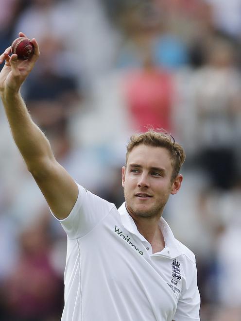 Stuart Broad acknowledges the crowd after taking his fifth wicket. Photo by Reuters.