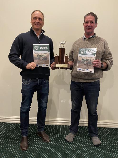 Mark Zino (left) and Dale Inch show their trophies for winning the highest points.