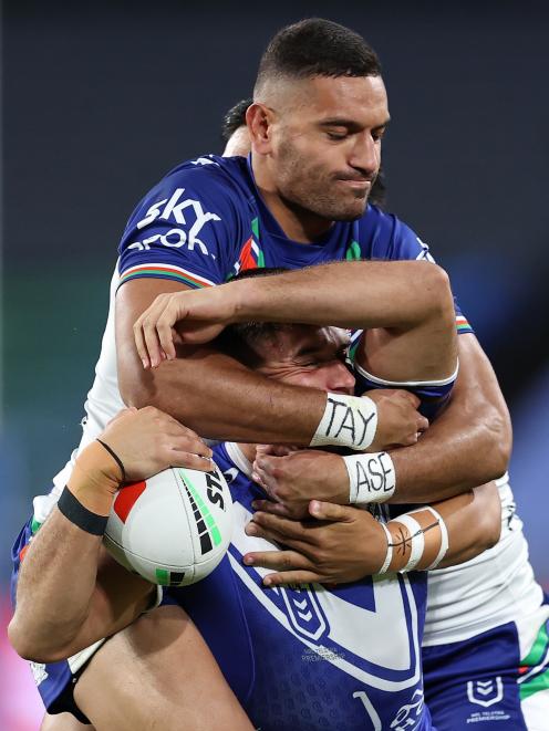 Jake Averillo, of the Bulldogs, is tackled during last night’s round 11 NRL match against the New...