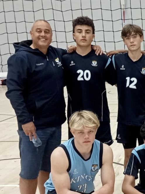 King's High School volleyball coach Andy Campbell with players (back from left) Nikora Wiparata...