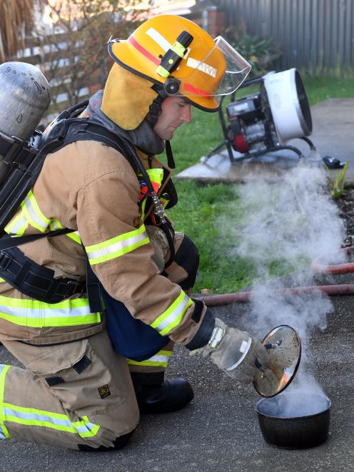 Qualified Firefighter Sam Shannon investigates a pot fire which caused substantial damage to a St...