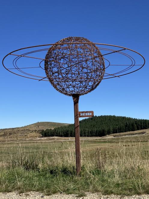 Models that accurately reflect the size of the sun, planets and our moon, and the distances...