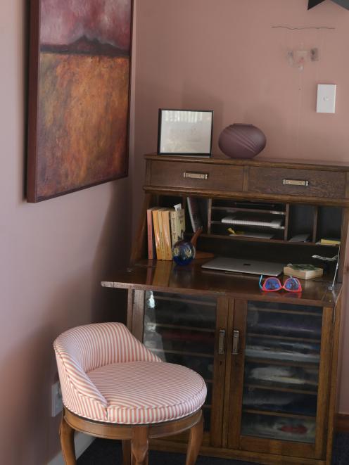 The dusty pink in the office area is Resene’s Brandy Rose.