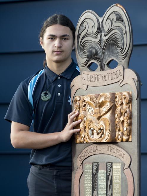 King’s High School pupil Zane Rakete-Gray with his rewards for winning the Ngā Manu Kōrero...