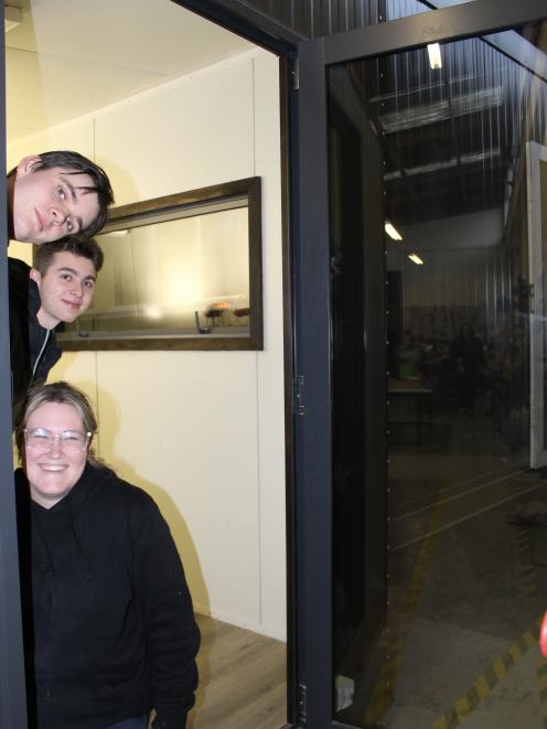 Taking a peek at the deluxe tool shed they constructed are Skillsec Building Boost participants ...