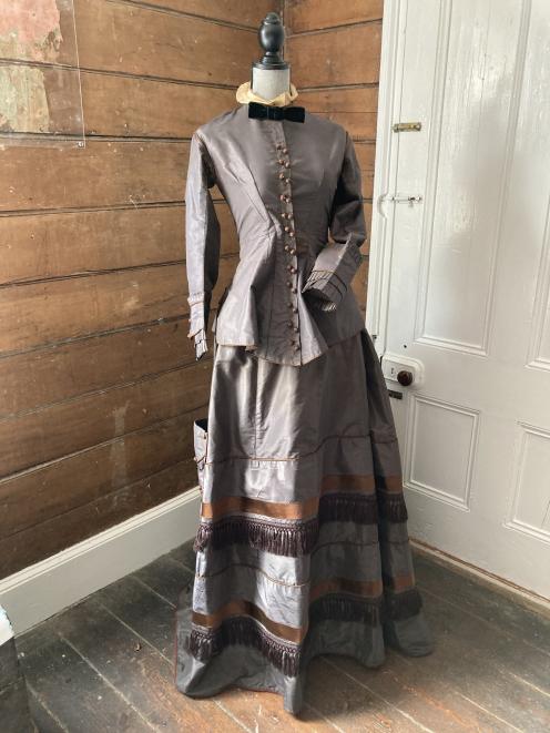 This silk taffeta wedding gown, owned by exhibition co-organiser Ruth Willis, was worn by her...