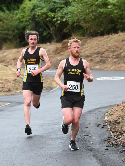 Oliver O’Sullivan leads Hill City University team-mate Luke Geddes at Roseneath.