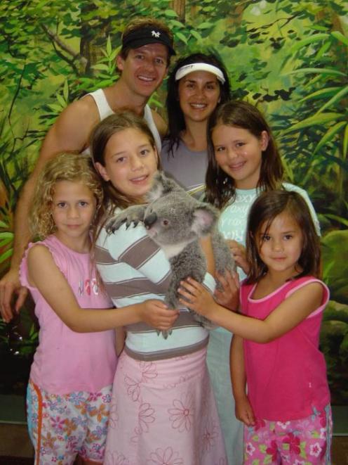 Simon and Jodi Barnett with their girls (from left Bella, Sophie, Samantha and Lily) on a family...