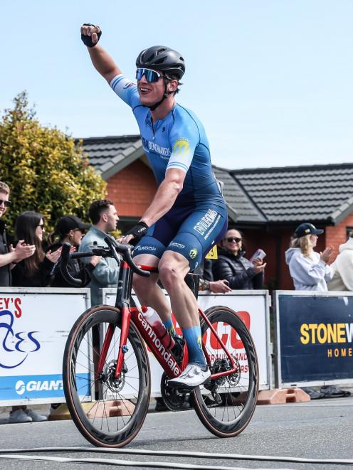 Otago rider James Gardner (Central Benchmakers-Willbike) celebrates winning stage one of the 67th...