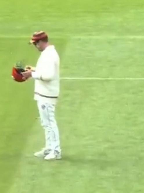 The moment in the video where Henry Nicholls appears to scrape the ball across the surface of a...
