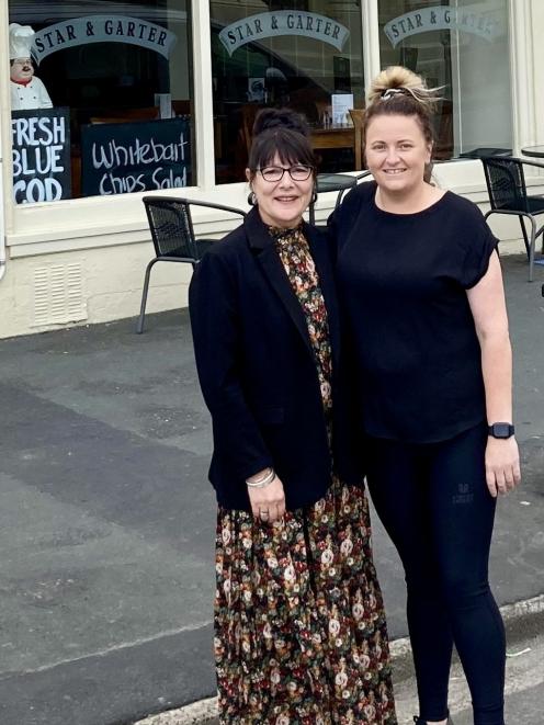 New Star and Garter restaurant owner Katie Robertson (right) says goodbye to her predecessor Lisa...
