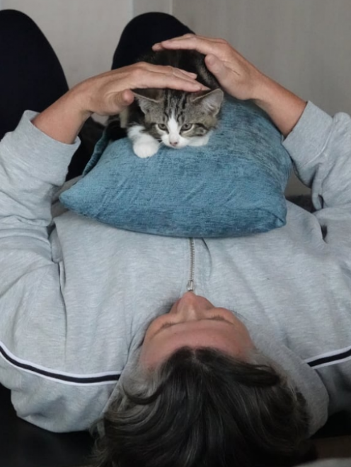 It's hard to tell who's more relaxed in this yoga pose. Photo: RNZ