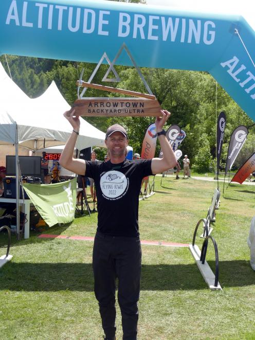 Arrowtown Backyard Ultra organiser Brandon Purdue pictured with the trophy destined for the...