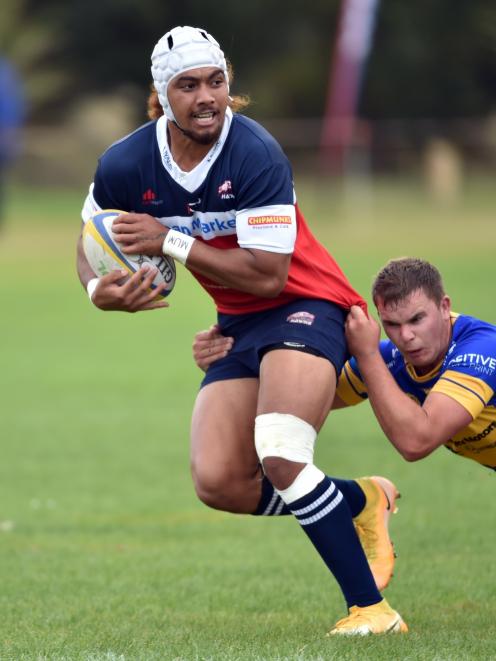 Viliami Fine is tackled while playing club for Harbour. PHOTO: ODT FILES