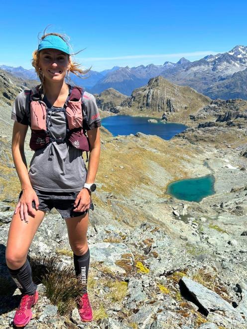 Maureen Stachowicz on the Serpentine Range, near the Routeburn Track, with Lake Wilson in the...