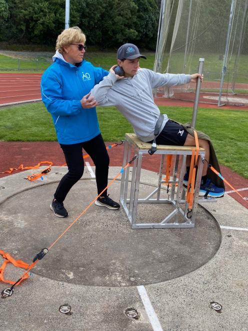 NZ Para throwing coach Raylene Bates working with Dunstan High School pupil Mac Denniston. PHOTO:...
