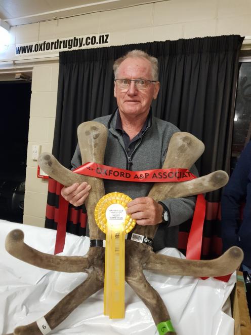 Craig Cockburn with the supreme overall champion head-of-velvet at the Oxford A&P Association’s...