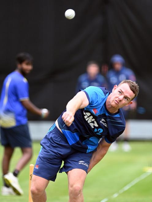 Black Caps rookie all-rounder Josh Clarkson sends down a delivery during a net session at the...