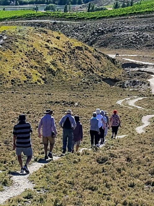 Walkers explore the Bannockburn Sluicings on a summer’s day. PHOTO: JENNY CHRISTENSEN