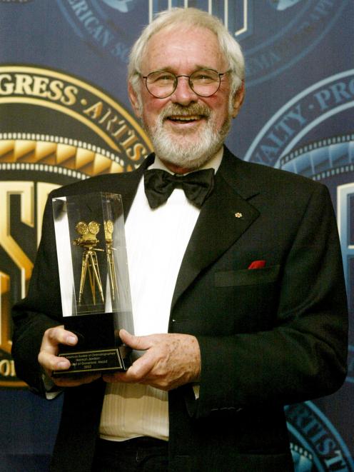 Norman Jewison holds his Board of Governors Award for outstanding achievement in 2003. Photo:...