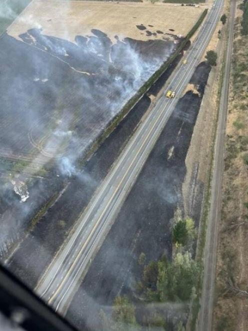 A photo taken from the air on February 6 shows the fire has burnt through areas on both sides of...