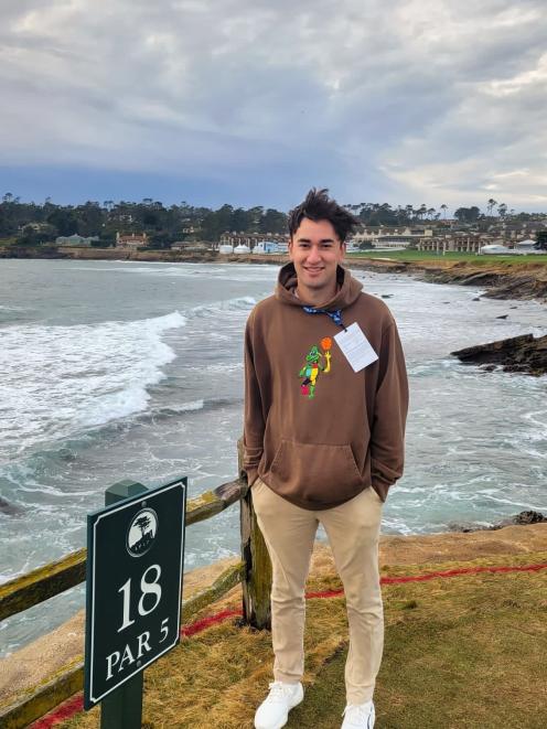 Wylie stands at the 18th hole at Pebble Beach, California, during his time working for Virtual...