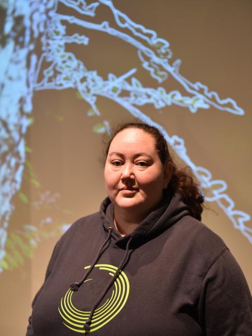 Artist Hayley Walmsley in front of her work at the Otago Museum. PHOTO: GREGOR RICHARDSON