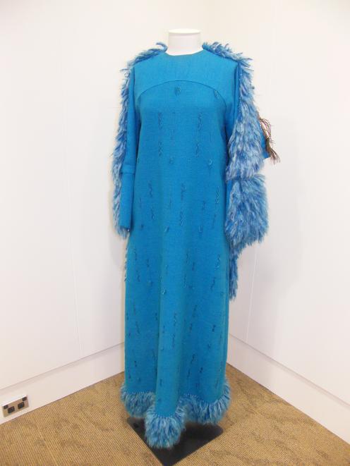 An evening dress and cape by New Zealand designer Beverly Horne from the Eden Hore collection is...