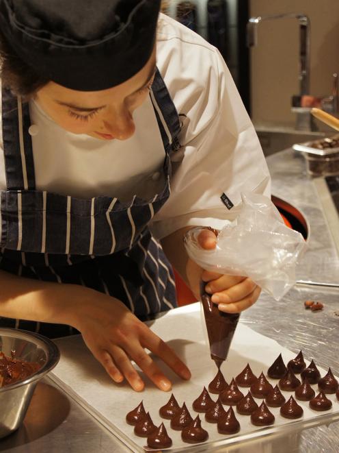 Elle Coco teaches a chocolate workshop at Harrods in London for William Curley.
