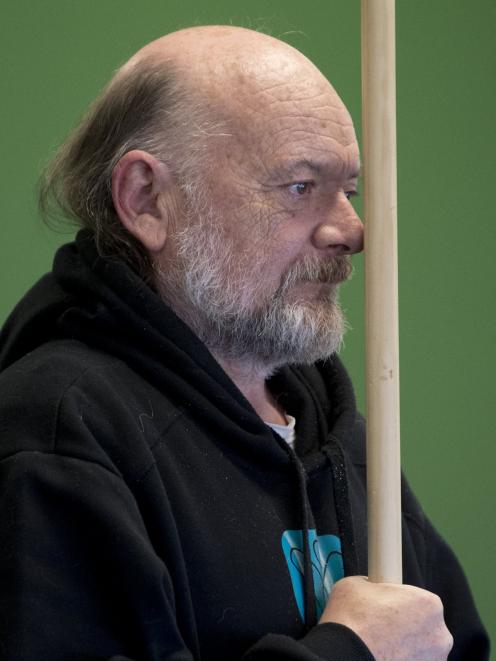 Doug Ditfort lengthens his spine.