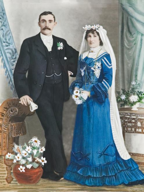 A hand colour gelatin print by an unknown artist of RJ Kelly and his unnamed bride is part of the...