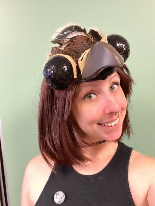 Costumier Gridley wears her ‘‘work in progress’’ headpiece for the kārearea costume.