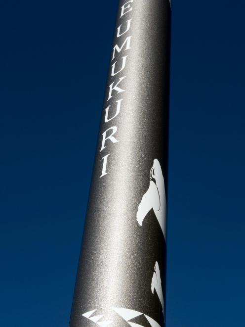A light pole with the name of a main whaling station designed by Ephraim Russell.