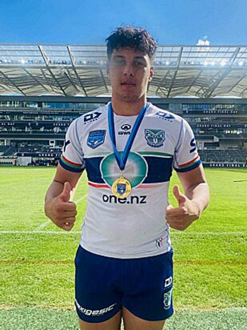 Kairus with his gold medal.