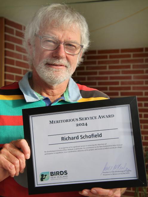 Richard Schofield with his Meritorious Service Award 2024 from Birds NZ. PHOTO: NICK BROOK