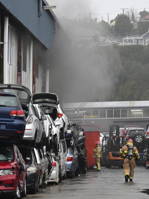 Fire and Emergency New Zealand crews attending a fire at Pacific Auto Parts yesterday. PHOTO:...