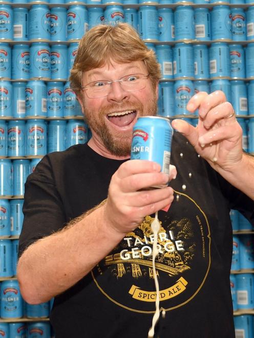 Emerson’s Brewery founder Richard Emerson cracks open a can of his Pilsner. PHOTO: STEPHEN JAQUIERY
