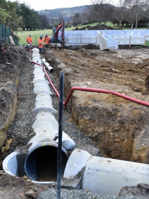 Contractors work on replacing water pipes in suburban Dunedin. PHOTO: PETER MCINTOSH