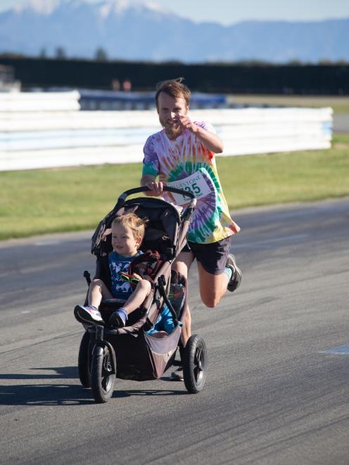 Matthew Linton parents on the run with his children Jacob and Silus (who was tucked safely...