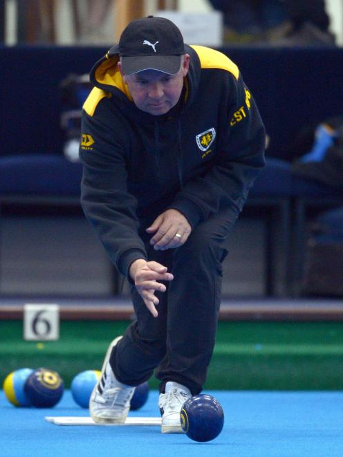 Ben King sends one down during the North East Valley premier mixed pairs tournament at the...