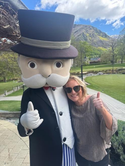 Mr Monopoly with Queenstown Business Chamber CEO Sharon Fifield. PHOTO: SUPPLIED
