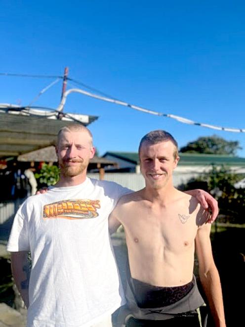 Matthew Simpson and Jack Newsome shaved their heads to mark the $1000 and $2000 fundraising...