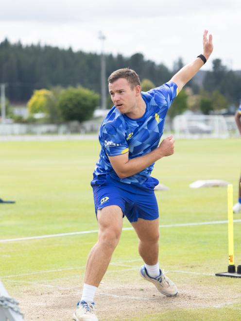 Newly minted Otago all-rounder Ruben Clinton sends down a delivery during a training session at...
