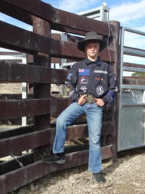 Codee with his 2024 New Zealand Steer Riding Championship belt buckle. PHOTO: NIC DUFF