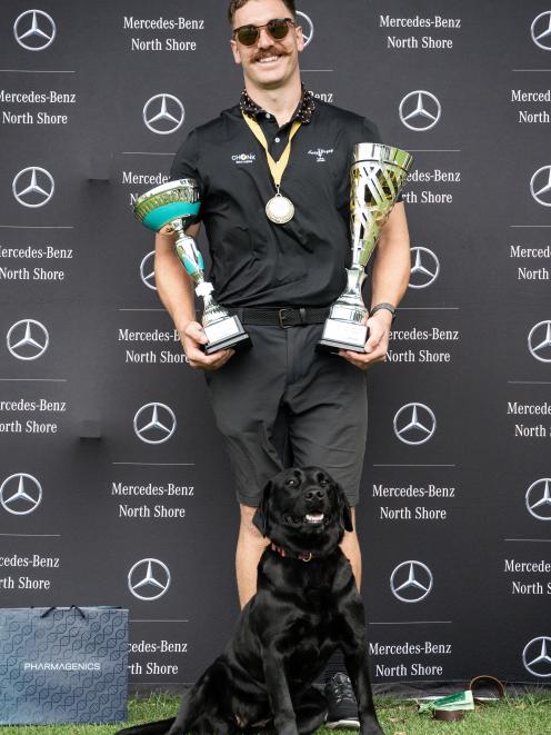 George Wardell celebrates his XDL championship wins with his ‘‘support person’’ for the...