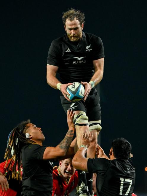 Oliver Haig rises high to claim lineout ball for the All Blacks XV against Munster in Limerick in...